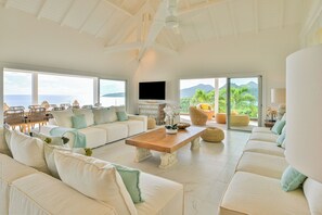 Air conditioning, ceiling fan, HD-TV, Dish network, DVD player, Apple TV. Outdoor lounge area on the covered terrace.
