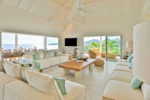 Air conditioning, ceiling fan, HD-TV, Dish network, DVD player, Apple TV. Outdoor lounge area on the covered terrace.