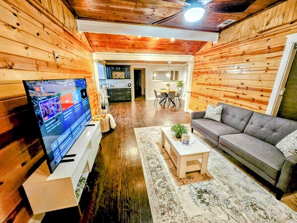 Spacious Open-concept Living Room: 65 inch Smart TV with YouTube TV  + HBO