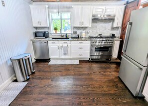 Full Kitchen with Microwave, Dishwasher, Gas Range, Oven, Toaster & Refrigerator