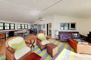 Another view of the great room with the kitchen in the background
