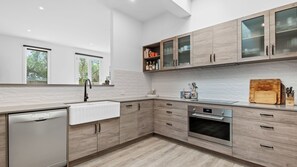 Modern well quipped kitchen with plenty of counter space.