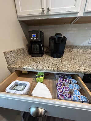Stocked coffee bar in kitchen...Includes Ground coffee and assorted Keurig cups.