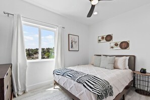 Bright and airy bedroom designed for relaxation. Perfect for relaxation!