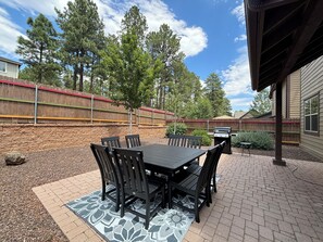 Backyard with grill and large table