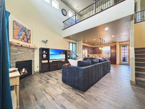 Great room with Lovsac sofa, big screen tv and gas fireplace