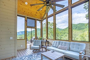 Covered / screened porch with incredible mountain views.  Ceiling fan and TV.