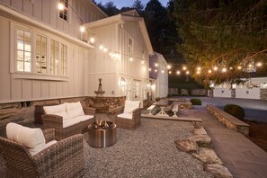 Front Patio with Fire Pit, Outdoor Seating and Lighting