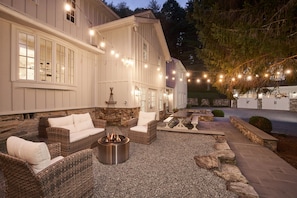 Front Patio with Fire Pit, Outdoor Seating and Lighting