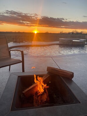 Wood Burning Fire Pit with views of the sunset.