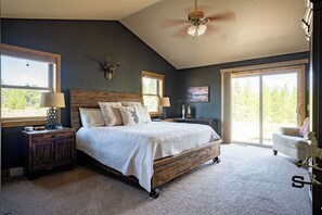 Main floor master with private large en-suite and patio door to open space