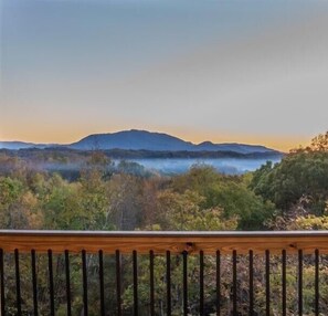 Breathtaking Mountain Serenity: Wake up to nature's masterpiece with panoramic views that stretch beyond the horizon.