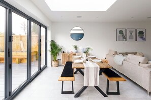 Open plan living with bi-fold doors to discover a wonderful outside area.