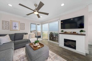 Sleeper sofa in living, sleeps 2. Electric fire place, and patio seating area with ocean views