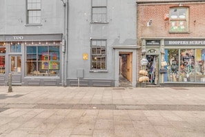 Experience the charm of the neighborhood with this street view, showcasing the welcoming atmosphere and local amenities just steps away from the property