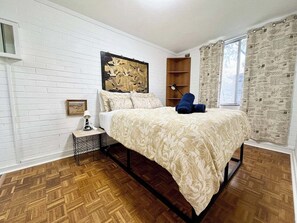 Queen bedroom with black out curtains