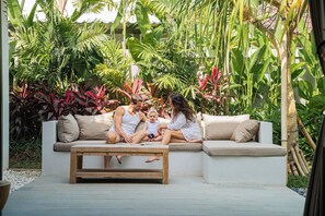Family time in the backyard seating area