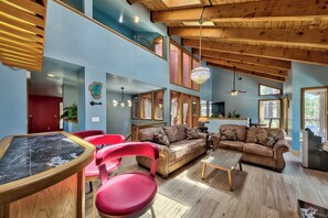 Vaulted ceilings in the living room create an open and spacious feeling