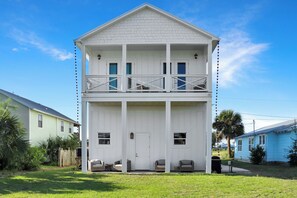 Rear Exterior with Covered Porch and Deck