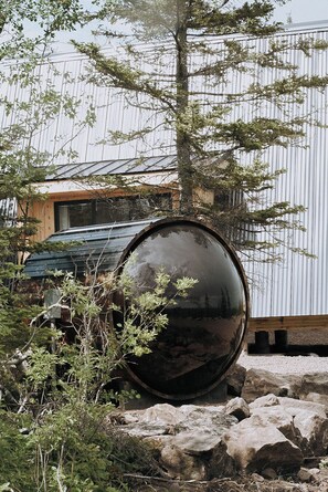 Exterior living space with private deck and panoramic barrel sauna (electric) near outdoor fire pit 