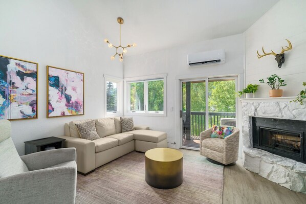 Welcome to Pines 303A, a modern, mountain condo with ultra-high ceilings leaving the condo feeling bright and fresh.