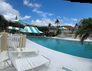 Take a refreshing swim in the pool.