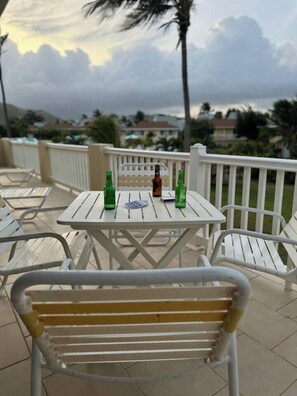 Enjoy outdoor dining on the balcony.
