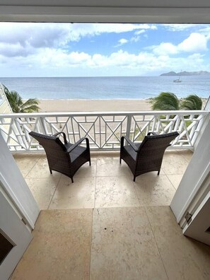 Oceanview balcony with the primary bedroom.