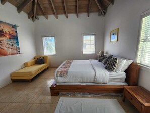 Second bedroom with queen bed and closet.