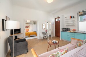 Livingroom,dining area , kitchen and Bedroom with two single beds. 