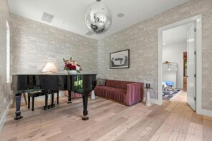 Sitting Area by Primary Bedroom (Piano not for guest use)