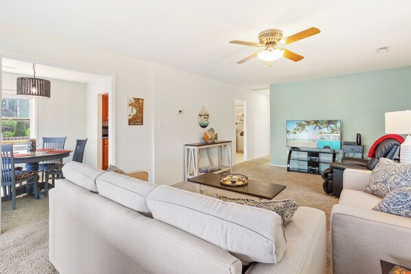 The open Living Area is perfect for gathering with loved ones after a day of exploring.