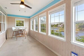 Enjoy your morning coffee or evening cocktails in the beautiful Sunroom, where you can soak in the picturesque views and gentle breezes.