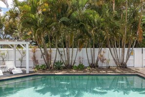Relax overlooking the pool in the Cabana.