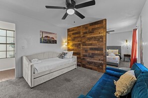 The room's tasteful design and soothing ambiance ensure a cozy sanctuary for relaxation and rejuvenation.
