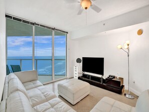 Unwind in the spacious living room, perfect for lounging with friends and family.