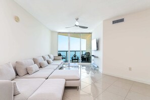 Extremely spacious living room and large sofa.