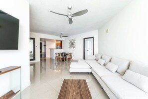 Extremely spacious living room and large sofa.