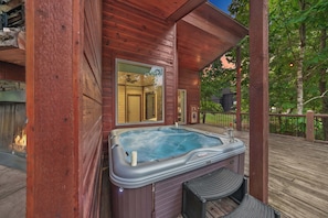 This hidden oasis wouldn't be complete without a hot tub where you can soak your cares away.