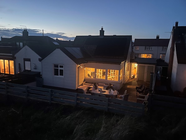 Marram Cottage Rear Garden at Dusk.
