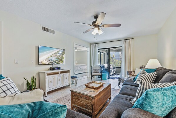The living room area with access to the proch.
