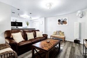 Furniture, Indoors, Living Room, Couch, Table