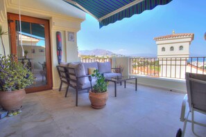 Seating area on terrace. 