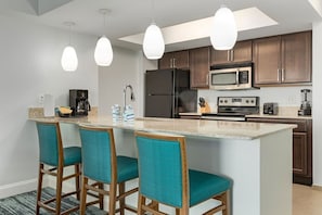 Unit may vary in layout, view, floor, and decor.
