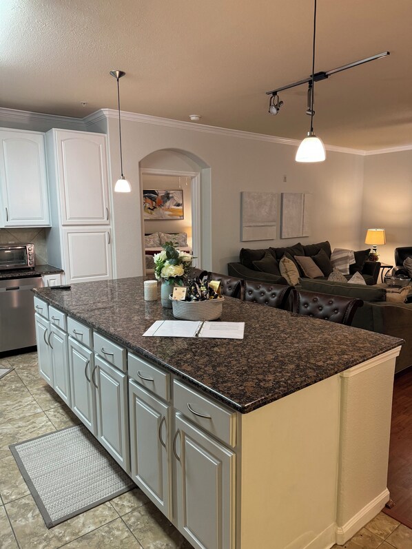 Kitchen with four bar stools