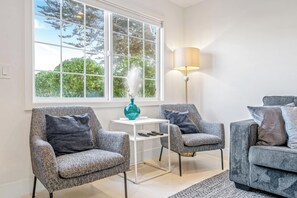 Curl up in the living room & enjoy a movie night by the gas fireplace
