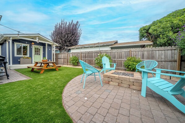 Gather around the firepit & make memories together during your stay