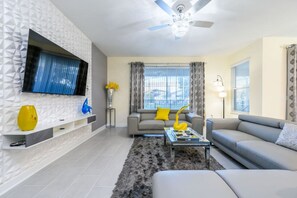 Contemporary Family Room with Separate Workspace Area