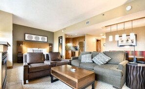 Cozy living room with comfortable seating and a warm ambiance.