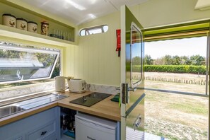 The compact kitchenette has everything you need to make basic meals and drinks.